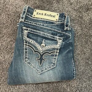 Rock Revival Blue Jeans with Embellished Back Pockets and Contrast Stitching